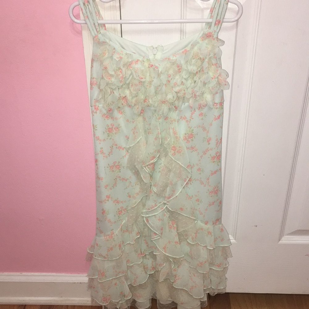 A beautiful dress with ruffles down the center
